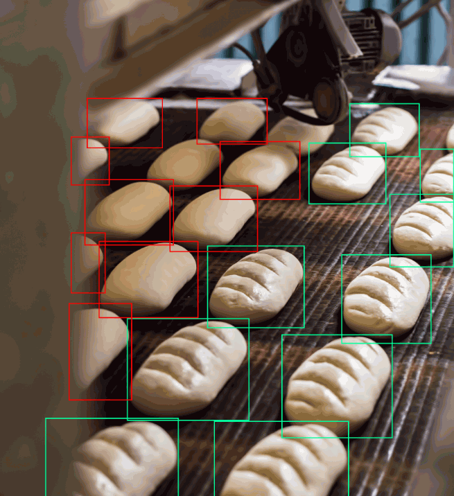 products on a production line annotated with bounding boxes